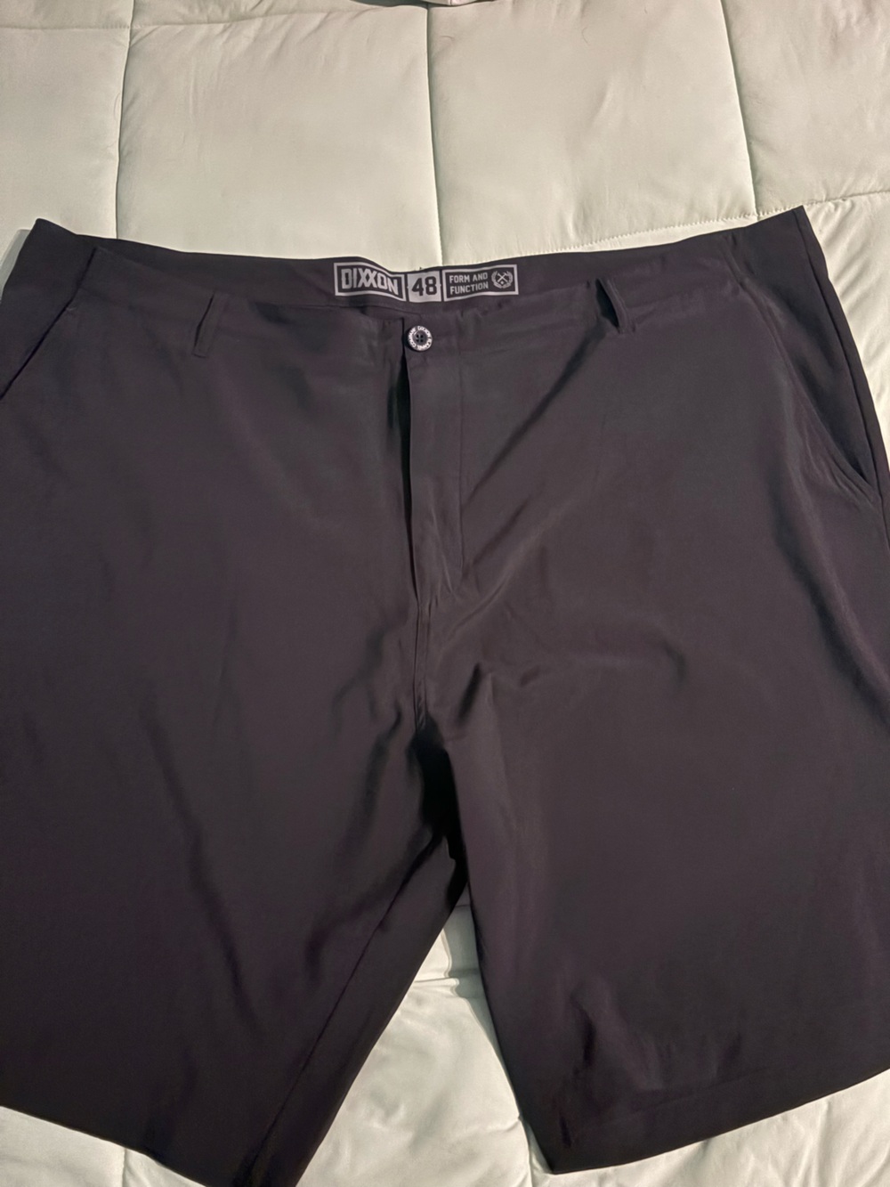 DIXXON Men's Solid Black Flat-Front Performance Shorts